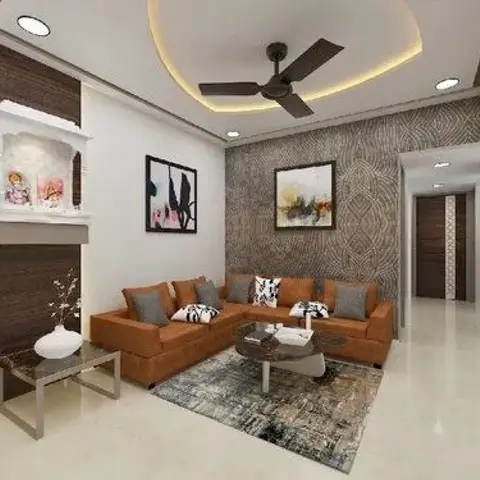 Living room with a rust-orange sectional sofa, a floral textured wallpaper accent wall, a wall-niche pooja unit, and a stepped POP cove ceiling