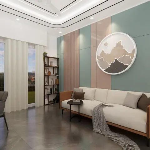 Living room with a sage-green and dusty-pink fluted panel wall centred on a round mountain-motif art piece, paired with a tan leather sofa and cove-lit ceiling.