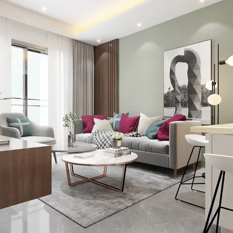 Living room with a sage-green accent wall, a grey sofa styled with magenta and teal cushions