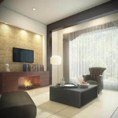Living room with a scalloped gold wallpaper accent wall behind a wood TV console with a built-in fireplace