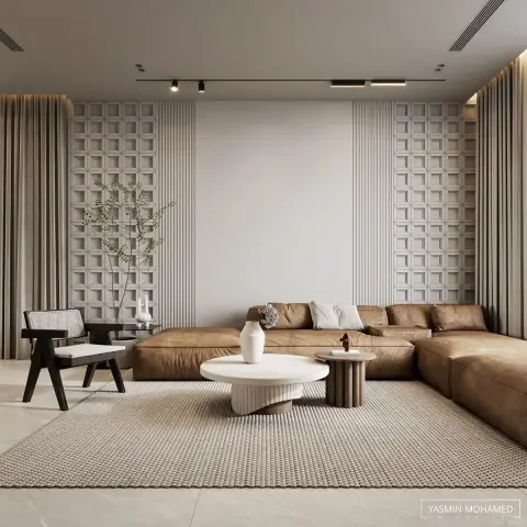 Living room with a tan leather modular sectional sofa, a geometric wood fretwork wall panel, sculptural round coffee tables, and a black cane-back accent chair.
