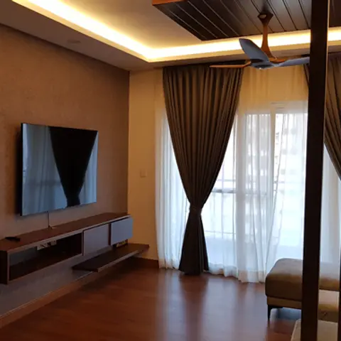 Living room with a textured taupe wallpaper wall behind a floating dark-wood TV console, a cove-lit ceiling with a wood slat accent strip