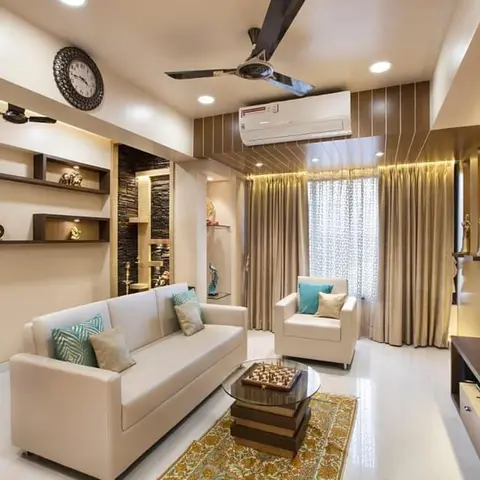 Living room with a wood-slat cove ceiling, a dark stone-textured display niche wall, floating wooden shelves styled with curios