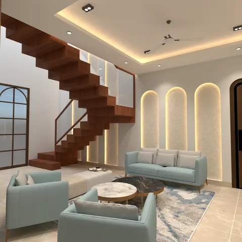 Living room with powder-blue upholstered sofas and armchairs around two round marble coffee tables