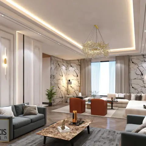 Long drawing room split into two seating groups, with grey-veined marble slabs framing the curtained window wall and a gold twig-form chandelier over the far