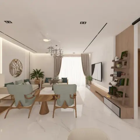 Long living room with white marble floor, two sage-green wooden-frame armchairs around a conical wood coffee table