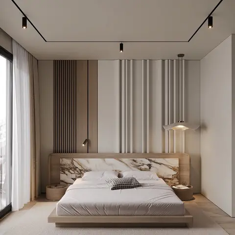 Low oak platform bed under a wall-width headboard inlaid with book-matched veined marble