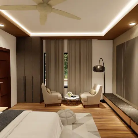 Master bedroom suite with a lounge nook of two armchairs by the window, a dark stone-clad TV wall with bench seating, and a backlit wave-art feature wall.