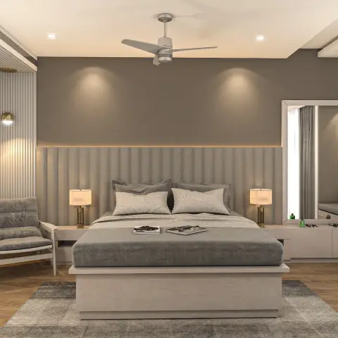 Master bedroom with a fluted grey upholstered headboard, symmetric nightstands with brass table lamps