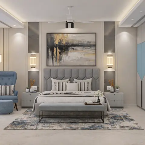 Master bedroom with a geometric channel-tufted grey headboard, a blue wingback chair, a bench at the foot of the bed