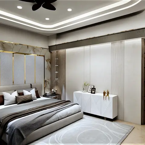 Master bedroom with a marble accent wall behind a gold-framed quilted headboard screen, a cove-lit stepped false ceiling