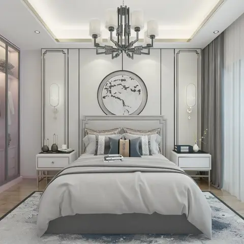 Master bedroom with a symmetric panelled headboard wall, a circular abstract art piece, twin nightstands, and a glass-fronted walk-in wardrobe to the side