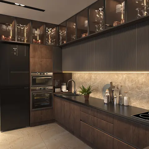 Moody dark-wood kitchen with backlit glass display cabinets, a fluted grey upper cabinet wall, integrated black appliances