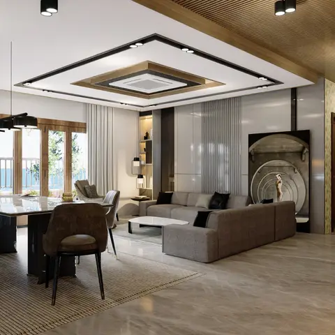 Open living and dining area with a grey L-shaped sectional sofa facing a circular abstract wall art panel