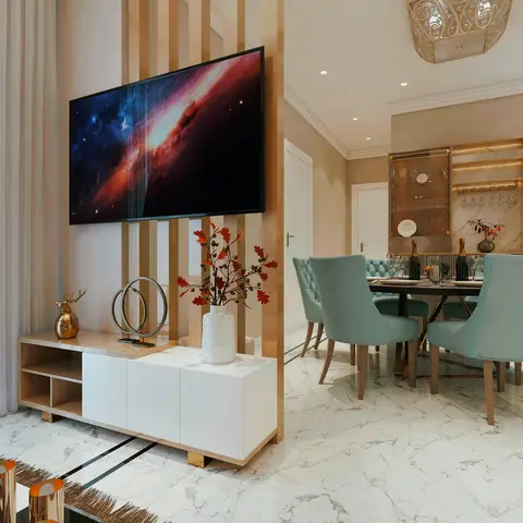 Open living-dining space divided by a vertical wood-slat partition, with a floating TV console on one side and a marble dining table with tufted teal velvet