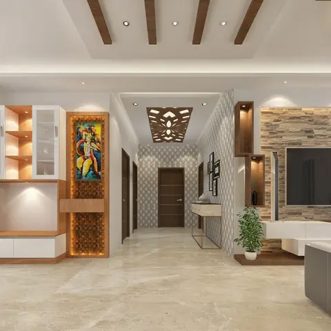 Open living space with a stone-clad TV wall and white console on one side, a mosaic-backlit Radha-Krishna art panel on the other