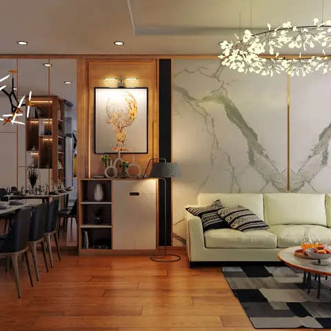 Open-plan dining and living space with a sculptural branch chandelier over an 8-seat table on one side and a cream sofa under a wreath pendant light on the