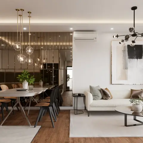 Open-plan dining and living space with a mirrored fluted-panel dining backdrop under clustered glass-globe pendants