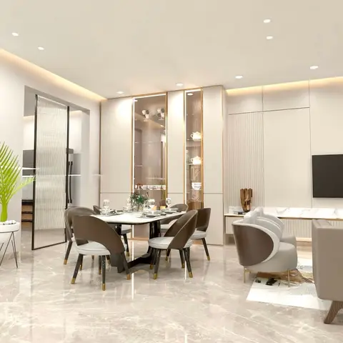 Open-plan dining and living space with a marble floor, a round table seating six under a gold-trimmed glass display cabinet, and a TV lounge area beyond.