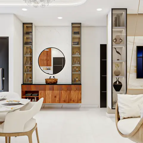 Open-plan entrance area with a fluted-wood wash console under a round mirror, flowing into a marble-top dining table and a hanging swing seat facing a