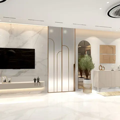 Open-plan entry and living area with a book-matched marble TV feature wall on one side and an arched-mirror entryway with a carved wood main door and console