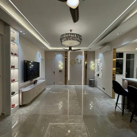 Open-plan full-home view with a glossy marble floor, a crystal drum chandelier over the foyer, a curved TV console on the left