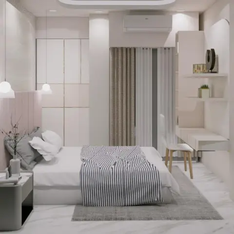 Pale pink channel-tufted headboard panel with two glass globe pendants dropping beside it