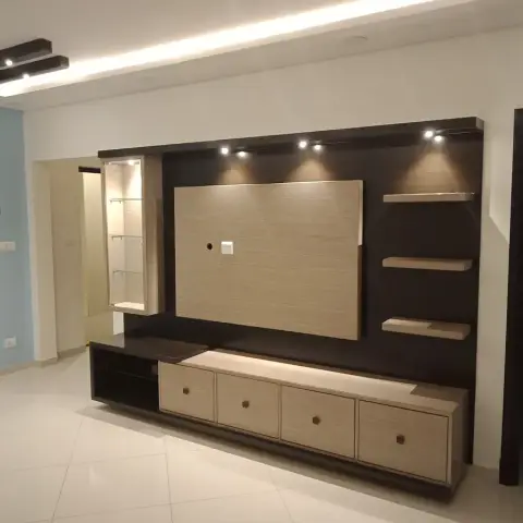 Photograph of a finished wenge-and-oak TV wall - four handle-fronted drawers in a row