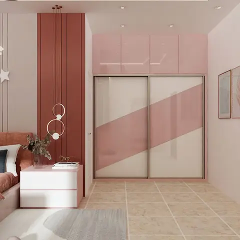 Pink-and-white kids' bedroom with a glossy sliding wardrobe, terracotta fluted wall panel, moon-and-stars wall decor and a three-piece gallery wall.