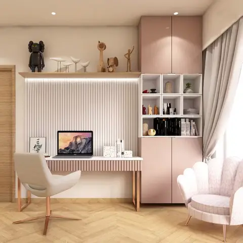 Pink and white study nook with a fluted-panel accent wall, floating rose-gold-legged desk, open display shelving