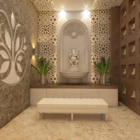 Pooja room render with a white Ganesha on a carved lotus pedestal in an arched niche, backlit floral jaali panels either side