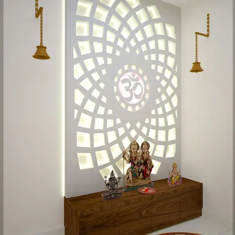 Pooja unit with a backlit CNC-cut mandala wall panel featuring an Om motif, a dark wood console holding deity idols, brass hanging bells