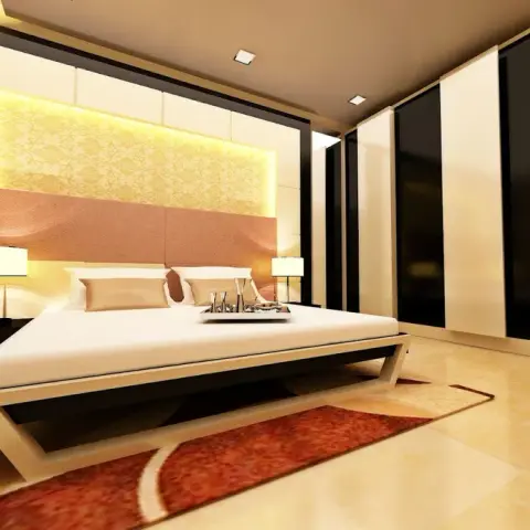 Render of a bedroom built around a cantilevered white platform bed, with a backlit damask-wallpaper recess over a copper upholstered band and a black-and-cream