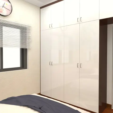 Render of a bedroom corner with a floor-to-ceiling glossy white wardrobe wall in a dark wood frame, a textured cream accent wall