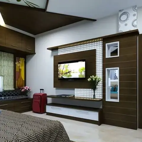 Render of a bedroom seen across the bed toward a TV panel framed in backlit mosaic tile