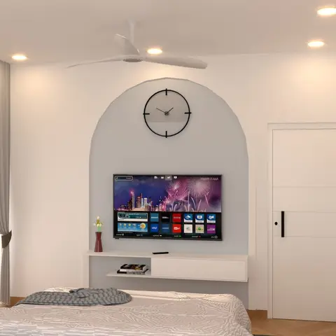 Render of a bedroom TV wall set into an arched pale-grey recess with a black open-frame wall clock above, a white floating console below