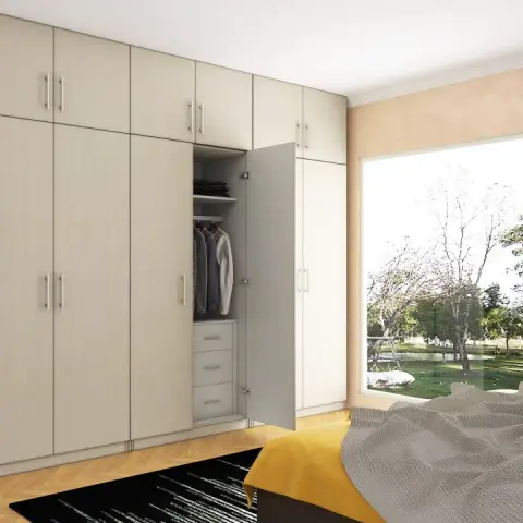 Render of a bedroom wall given over to a cream hinged-shutter wardrobe with lofts, one shutter left open on hanging rods and internal drawers