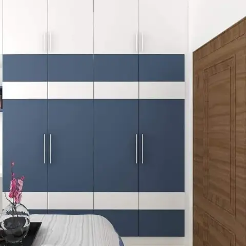 Render of a bedroom wardrobe wall in navy and white banded shutters with loft units