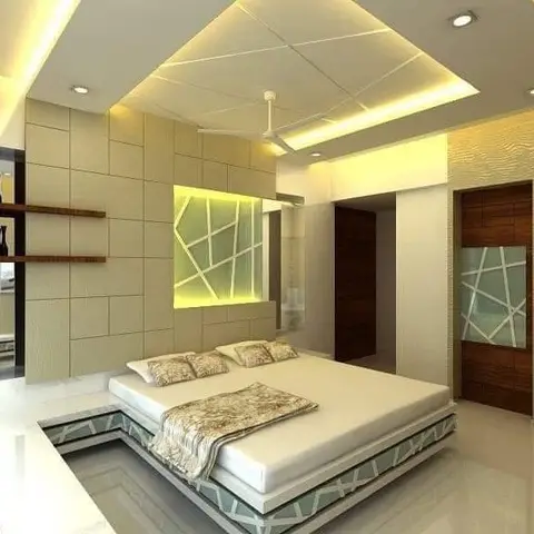 Render of a bedroom with a raised platform bed on a fractured-glass-pattern base, a tufted feature wall behind, and a multi-tier cove-lit false ceiling.