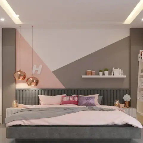 Render of a bedroom with a blush-and-grey diagonal colour-blocked wall, a channel-tufted headboard running the full wall width