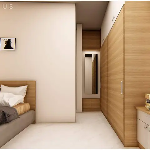 Render of a bedroom with a grey upholstered bed against a cream partition wall hung with framed prints