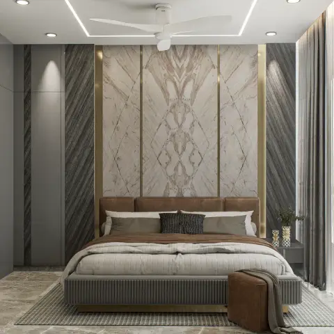 Render of a bedroom with a book-matched marble and brass-trimmed headboard wall, grey fluted wardrobe panelling, and a tan leather bed.