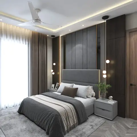 Render of a bedroom with a channel-tufted charcoal upholstered headboard wall, strings of globe pendant lights flanking the bed, a fluted wood wardrobe