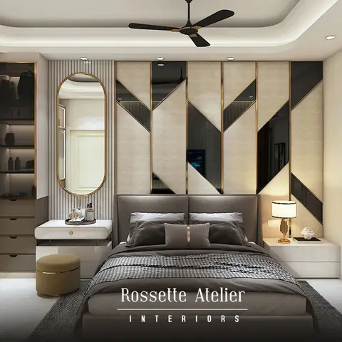 Render of a bedroom with a chevron-segmented headboard wall in beige leatherette and bronze mirror with brass dividers
