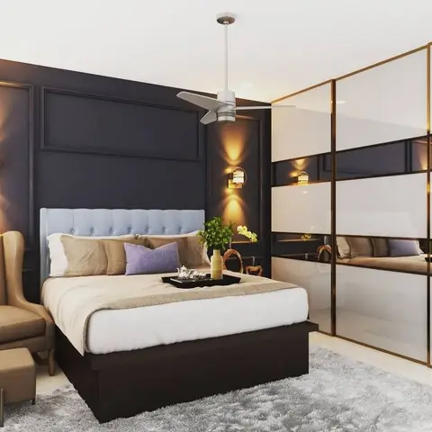 Render of a bedroom with a navy panel-moulded headboard wall, brass wall sconces, a tufted pale-blue headboard, and a mirrored wardrobe with a brass grid frame.