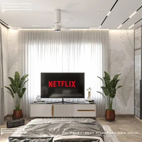 Render of a bedroom with a grey feather-motif wallpaper accent wall behind a fluted cream TV console with brass inlay