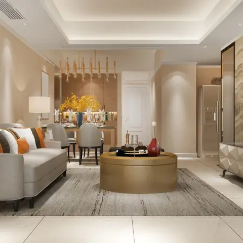 Render of a beige open living-dining where a gold drum coffee table sits on a striated grey rug facing a TV on a backlit onyx panel with a faceted white