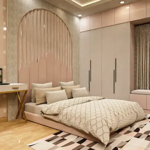 Render of a blush-pink bedroom with a tall arched fluted headboard panel, polka-dot wallpaper above a gold X-leg desk