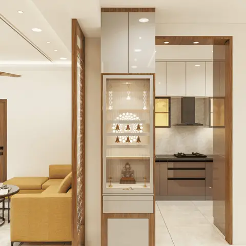 Render of a built-in pooja unit with fluted glass doors, brass bells and a deity idol, flanked by a jaali screen, opening to living and kitchen areas.