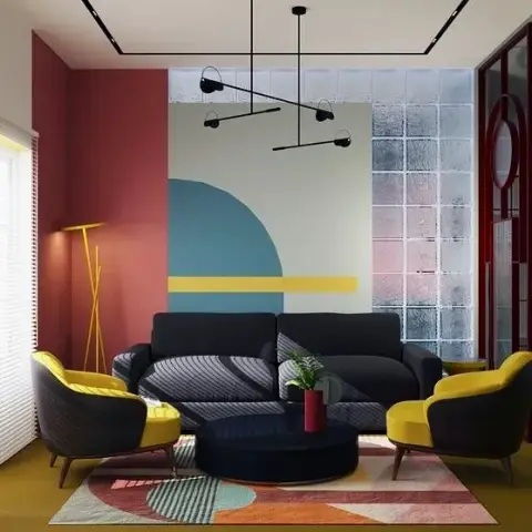 Render of a colour-blocked living room: a navy three-seater flanked by two mustard armchairs on a geometric rug